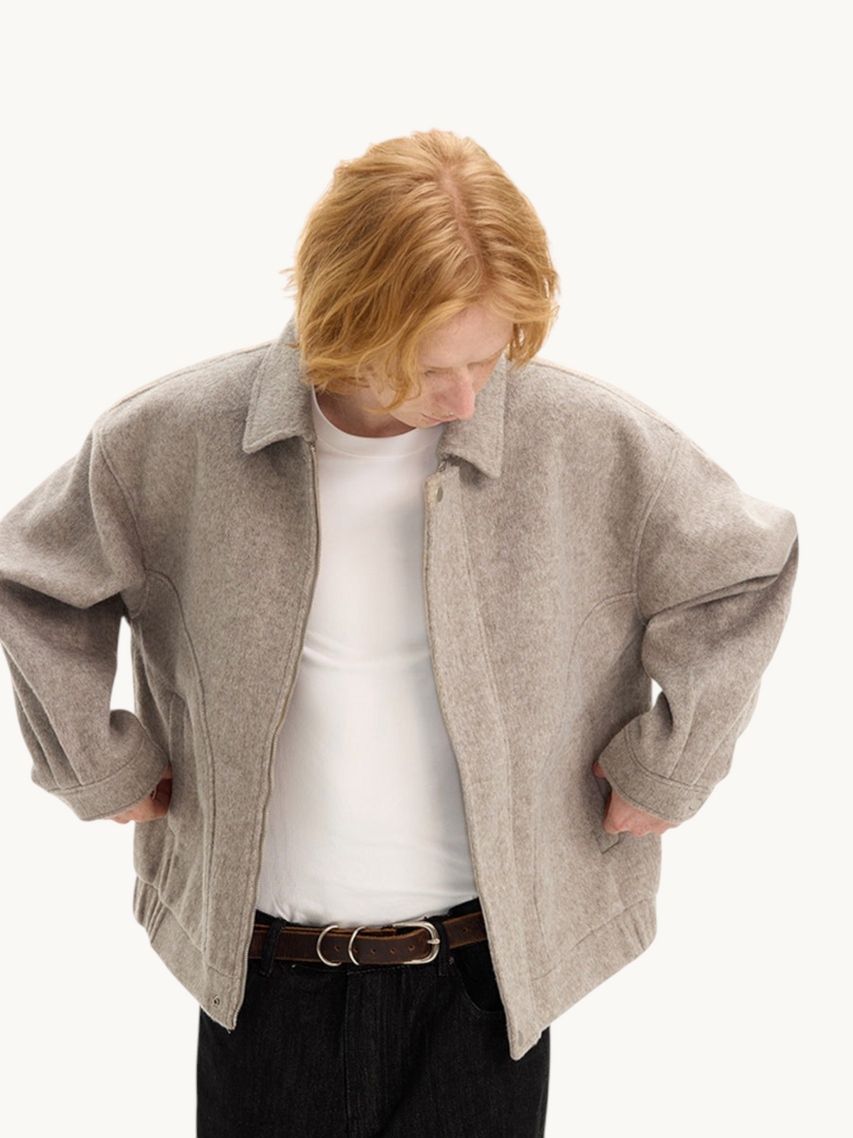 By Old Money beige double-faced wool boxy jacket with drop shoulders and front button closure on a model