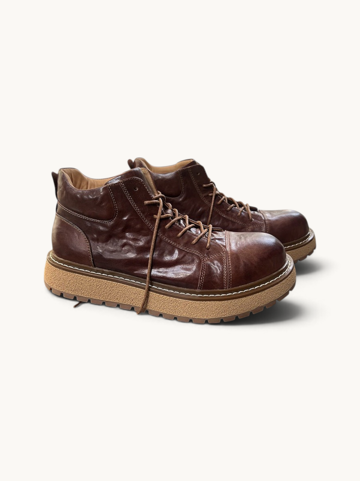 By Old Money brown full-grain leather work boots with a mid-height shaft, lace-up closure, and thick lugged sole.