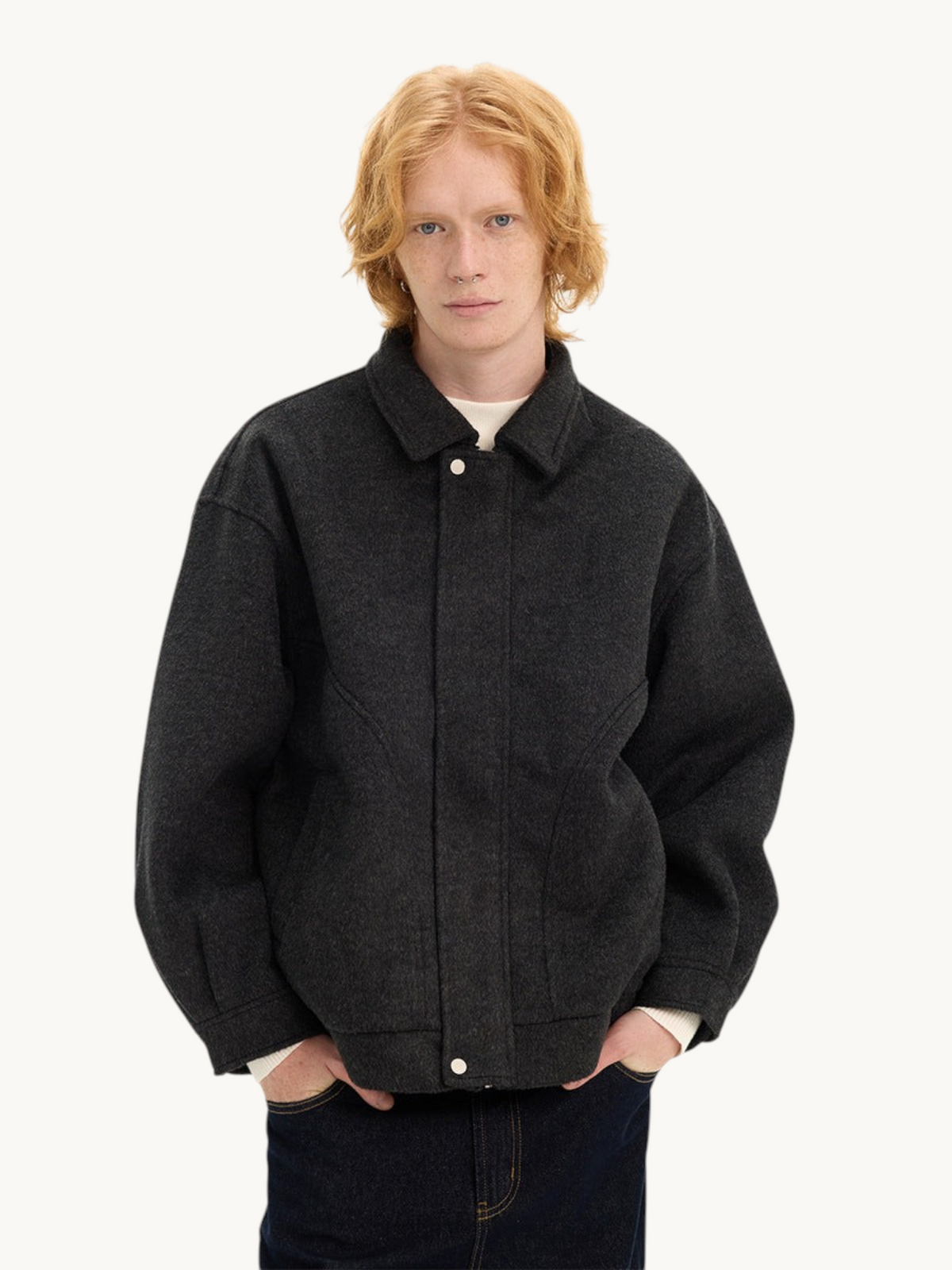 By Old Money charcoal grey double-faced wool boxy jacket with a collar and drop shoulders worn by a male model.