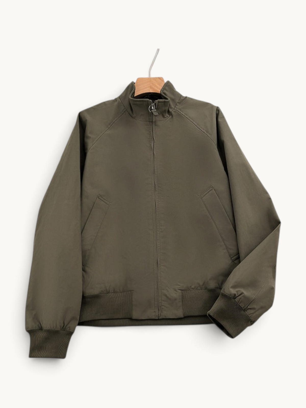 By Old Money olive green lightweight blouson jacket with a stand-up collar, zip front, and ribbed cuffs.