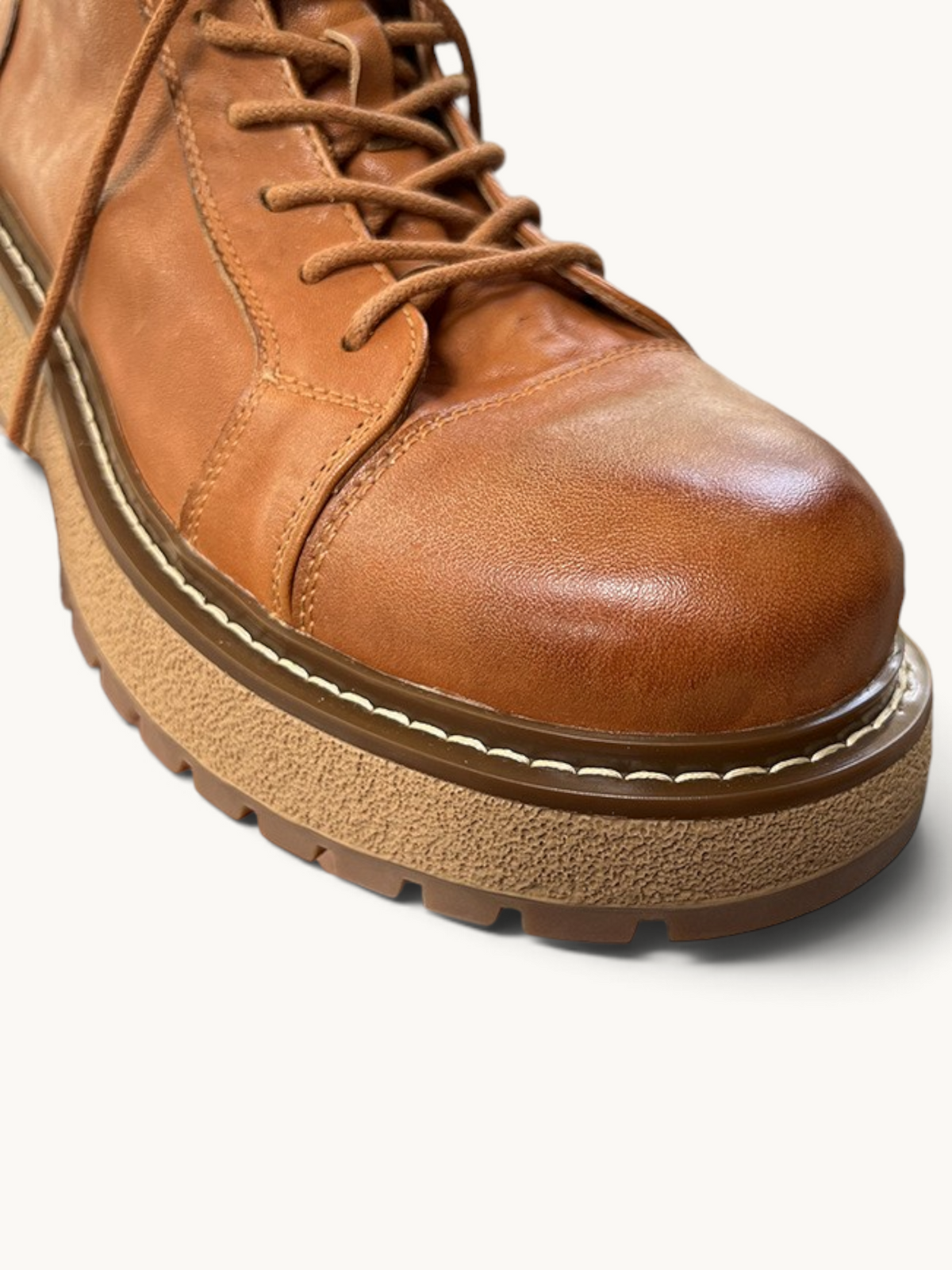 By Old Money tan full-grain leather work boots with a thick lug sole and detailed stitching