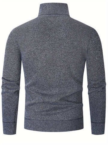 Pull torsadé col roulé