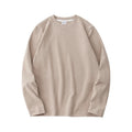 Sous-pull thermique beige à manches longues, posé à plat, vue de face