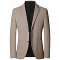 Blazer beige à motif pied-de-poule discret, deux boutons et poches plaquées, à plat