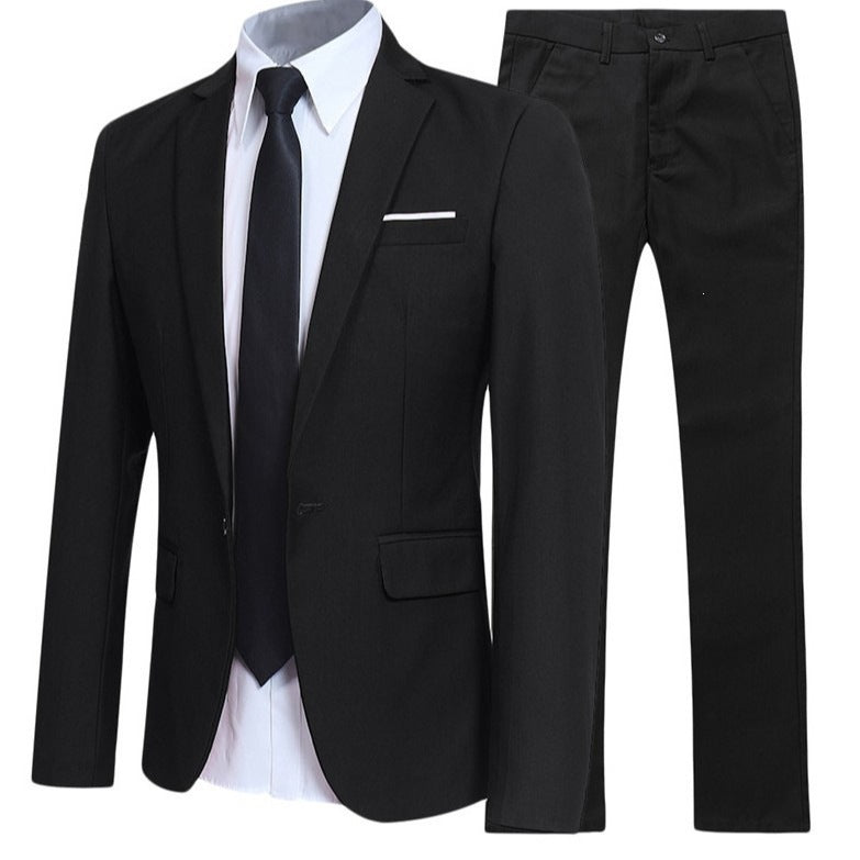 Ensemble costume noir à plat : veste un bouton, chemise blanche, cravate et pantalon