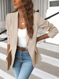 Blazer long ouvert, coloris beige, vu de face