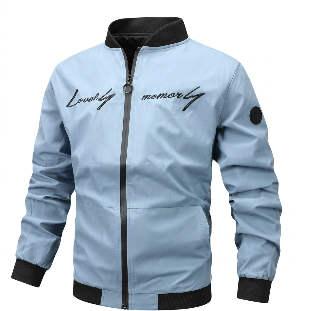 Blouson aviateur bleu ciel brodé, col et poignets noirs, de face