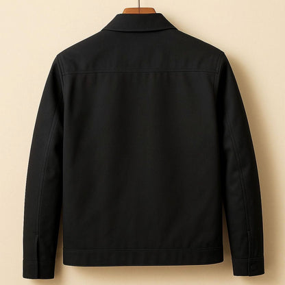 Dos du blouson zippé noir sur cintre