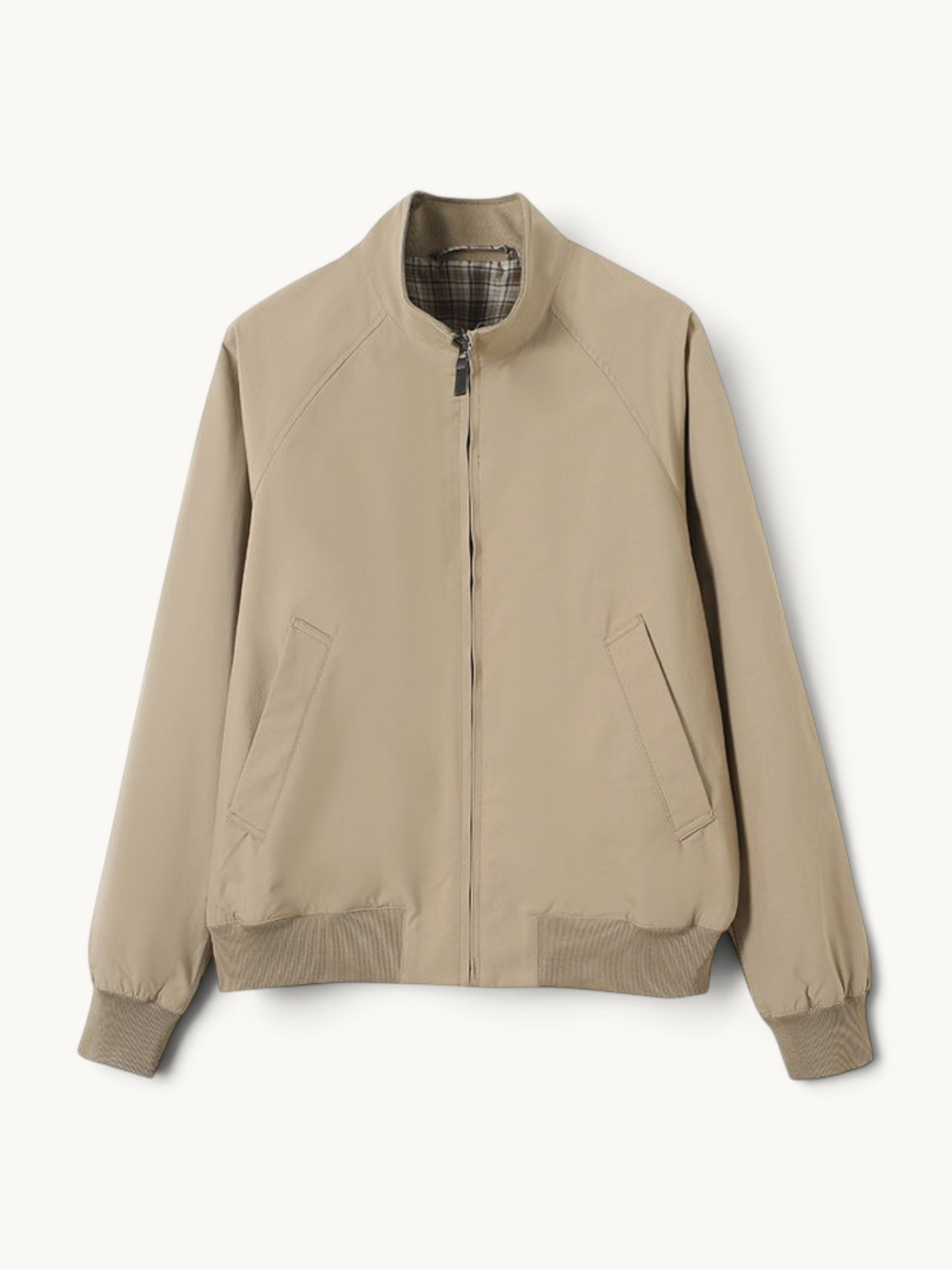 By Old Money beige lightweight blouson jacket with a stand-up collar, zip closure, and ribbed cuffs.