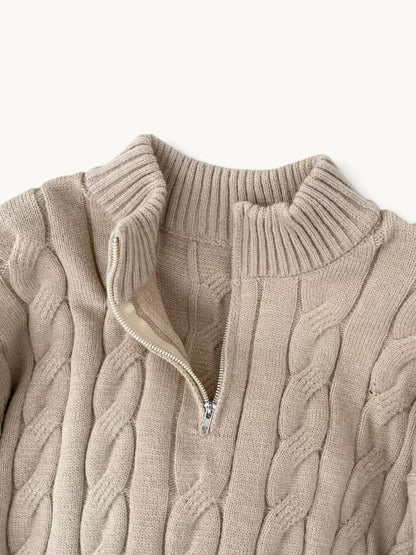 By Old Money beige cable knit sweater with a high collar and silver half-zip detail