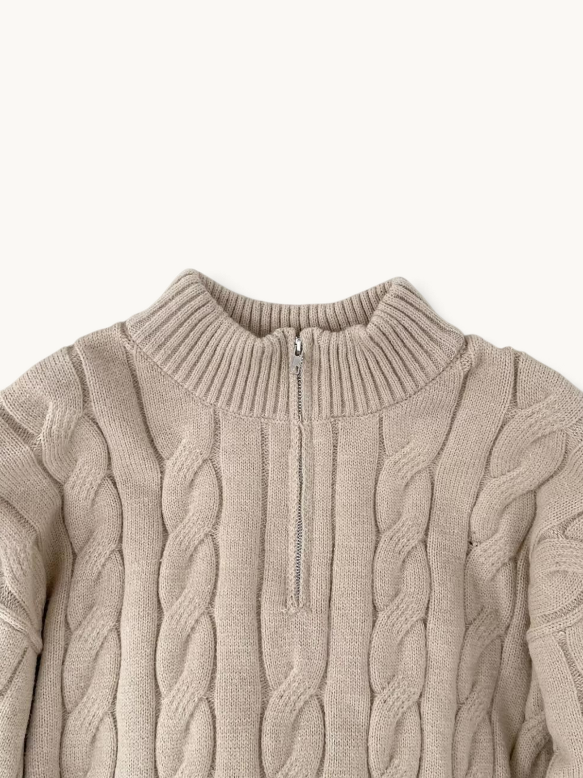 By Old Money beige cable knit sweater with a high collar and half-zip closure, featuring thick textured wool.