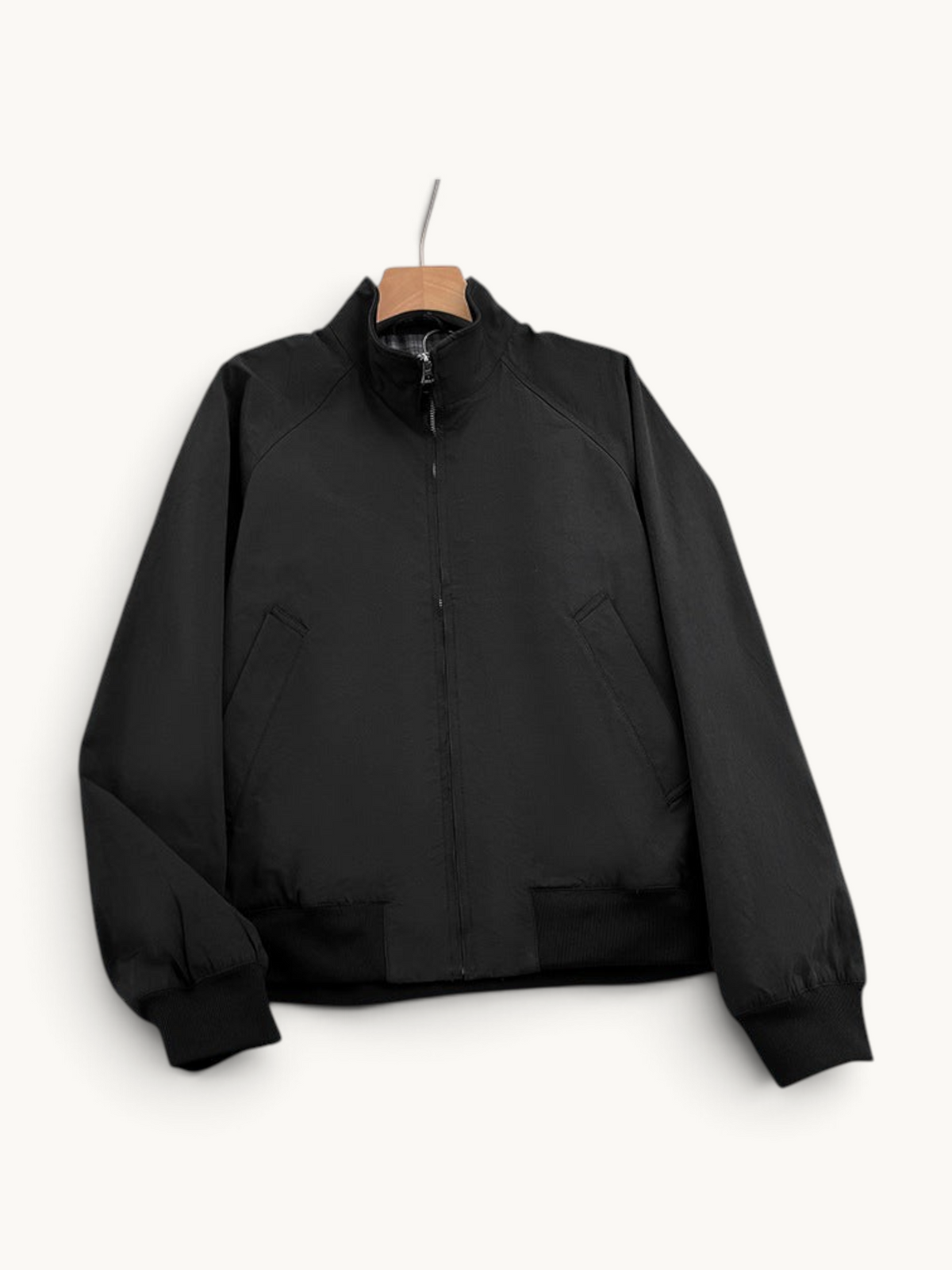 By Old Money black lightweight bomber jacket with a stand-up collar, full zip closure, and ribbed cuffs.