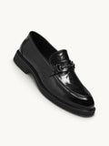By Old Money black leather loafers with a polished finish and metal horsebit detail on a clean white background
