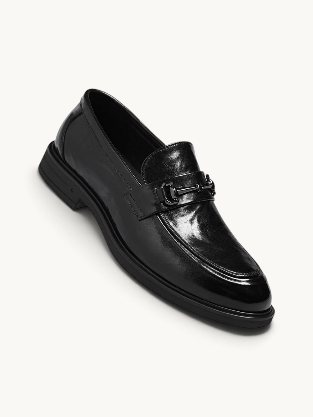 By Old Money black leather loafers with a polished finish and metal horsebit detail on a clean white background