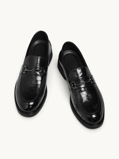 By Old Money black leather loafers with a polished finish and metal horsebit detail on a clean white background.