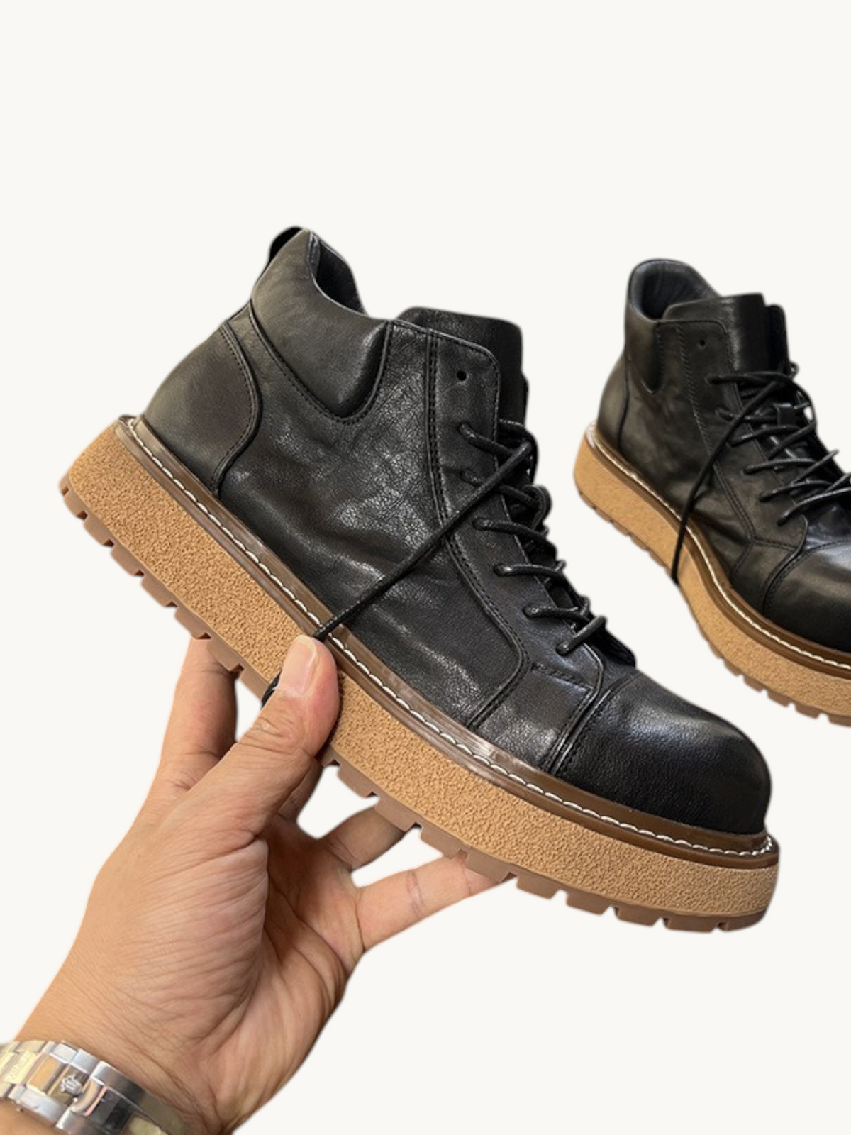 By Old Money black full-grain leather work boots with a thick lug sole and ankle-high lace-up design.