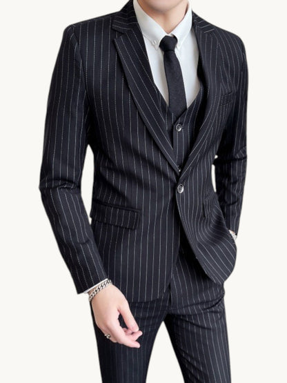 By Old Money slim fit black pinstripe suit with a single-button jacket and matching waistcoat