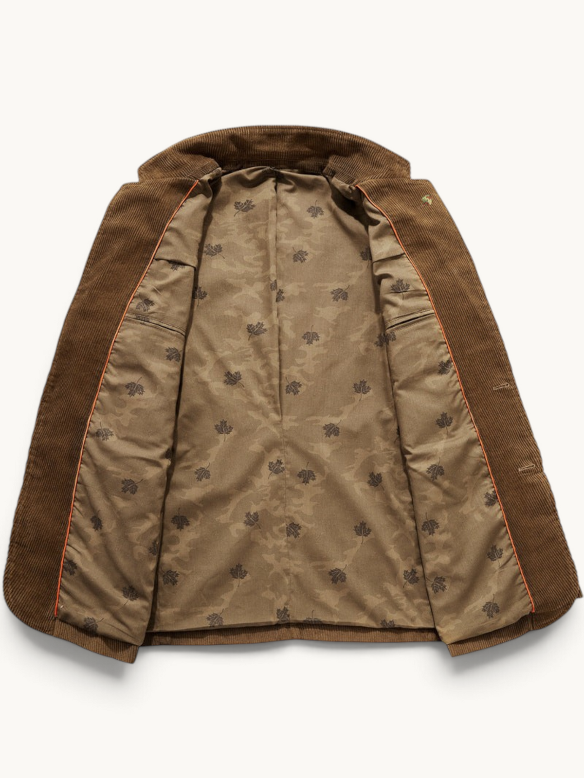 By Old Money brown corduroy blazer with a notched lapel and interior lining featuring a subtle leaf pattern.