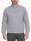 By Old Money grey cable knit half-zip sweater with a high collar worn by a man against a white background.