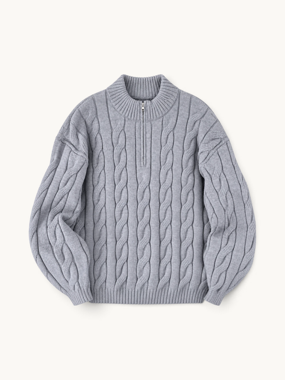 By Old Money grey cable knit half-zip sweater with a high collar and ribbed cuffs on a neutral background.