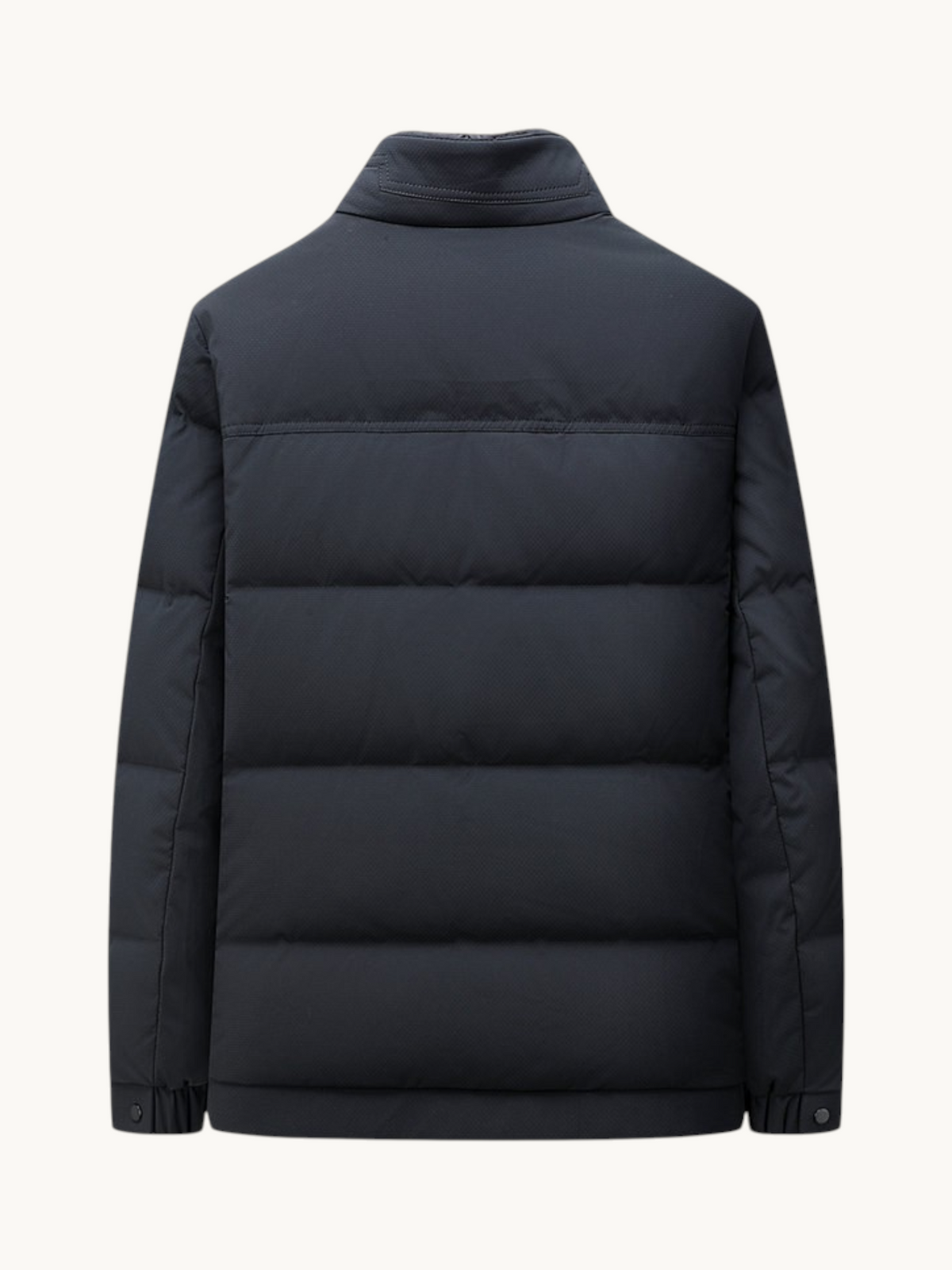 Back view of a By Old Money navy blue quilted winter puffer jacket with a high collar and straight cut