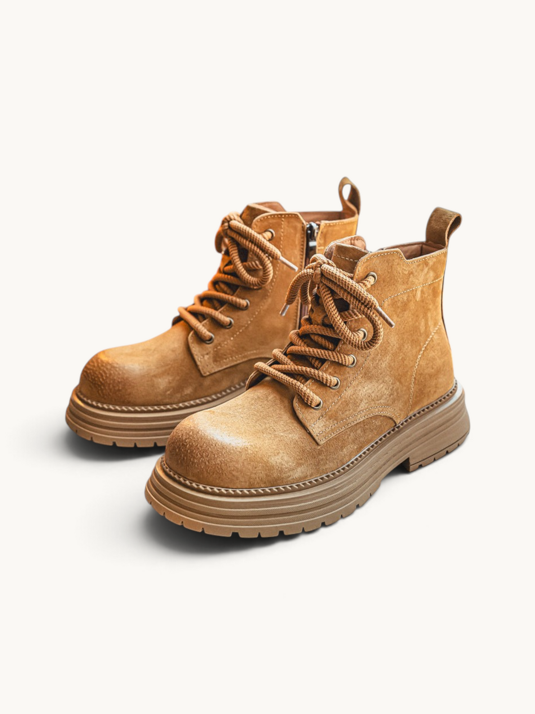 By Old Money tan suede desert boots with thick lug soles, side zip closure, and sturdy lace-up design.