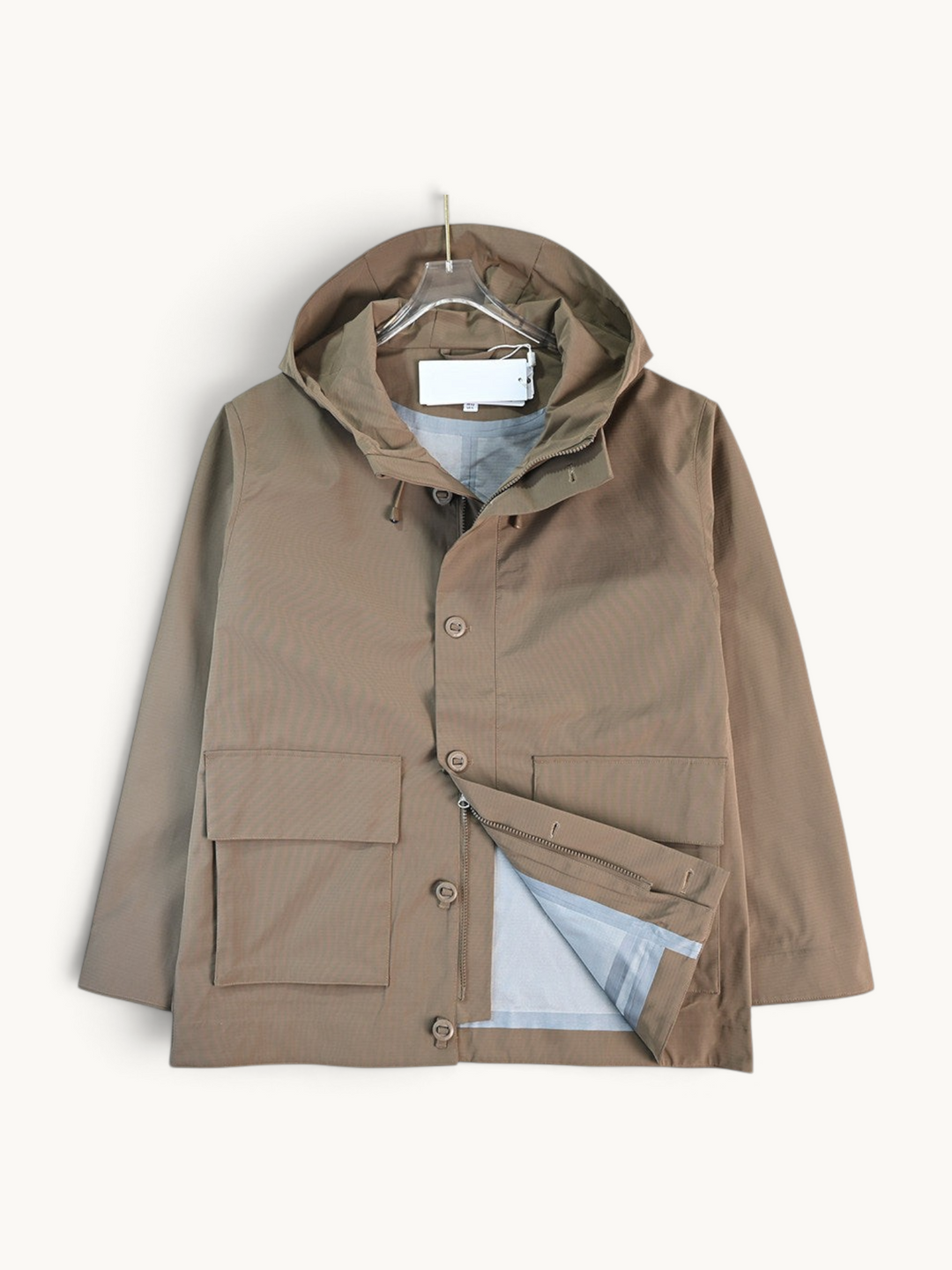 By Old Money water-repellent hooded jacket in matte brown with large flap pockets and a drawstring hood.