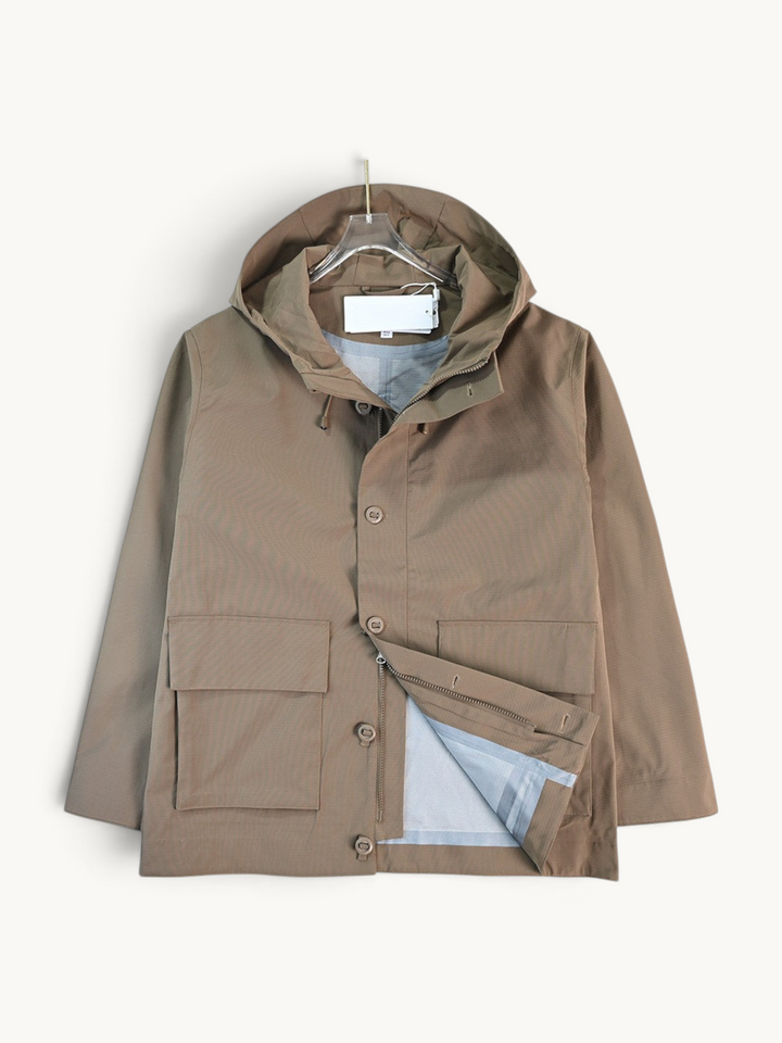 By Old Money water-repellent hooded jacket in matte brown with large flap pockets and a drawstring hood.