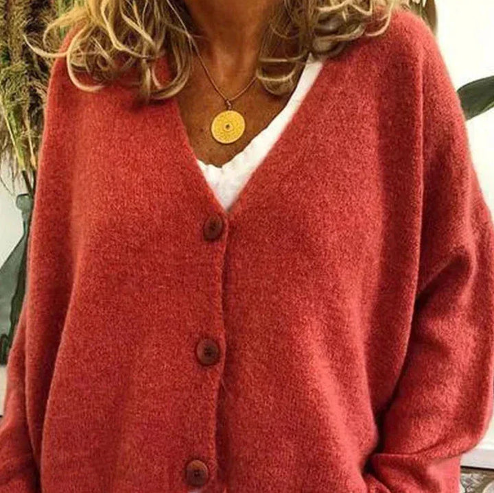 Cardigan boutonné à col V, coloris orange clair, vu de face