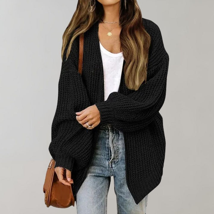 Cardigan ouvert en grosse maille, coloris noir, vu de face