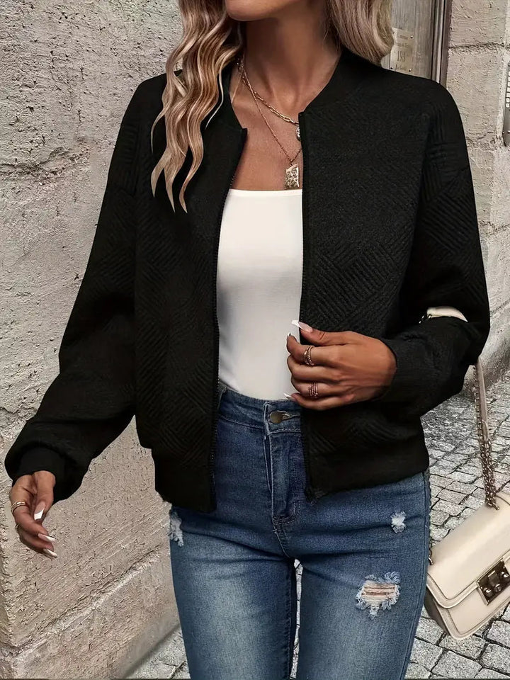 Cardigan zippé en maille texturée, coloris noir, vu de face