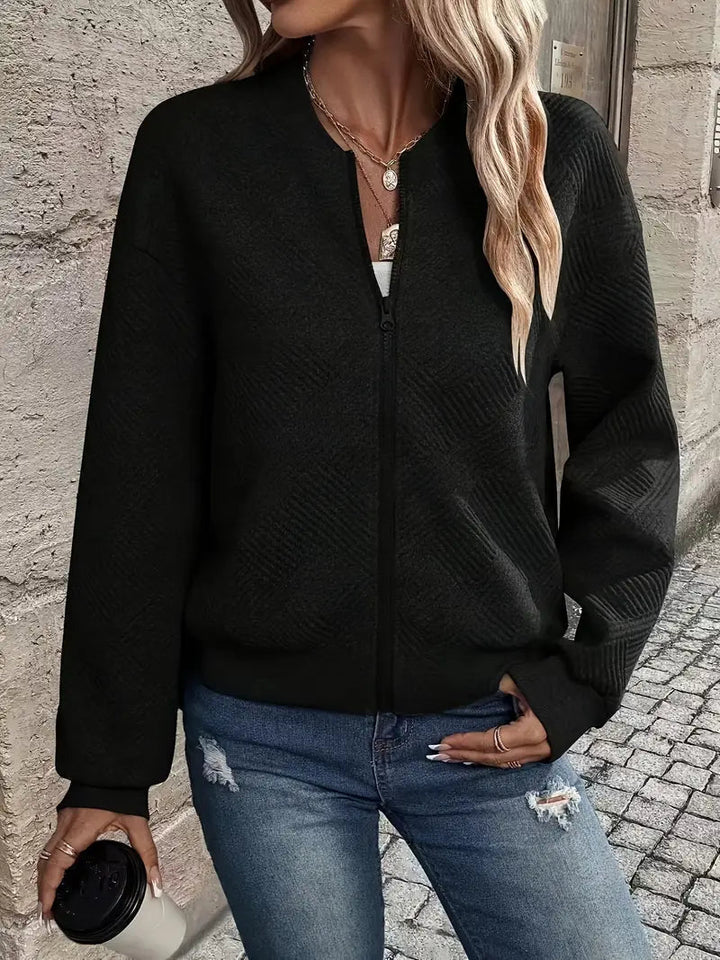 Cardigan zippé en maille texturée, coloris noir, vu de face