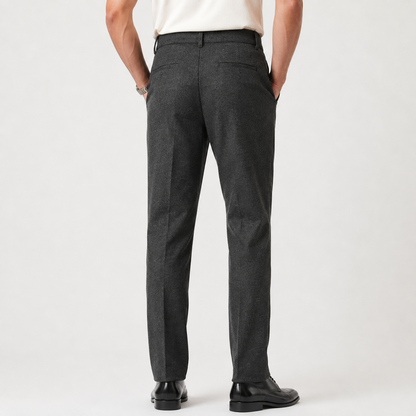 Charcoal tailored trousers with pleats and belt loops, back view on model