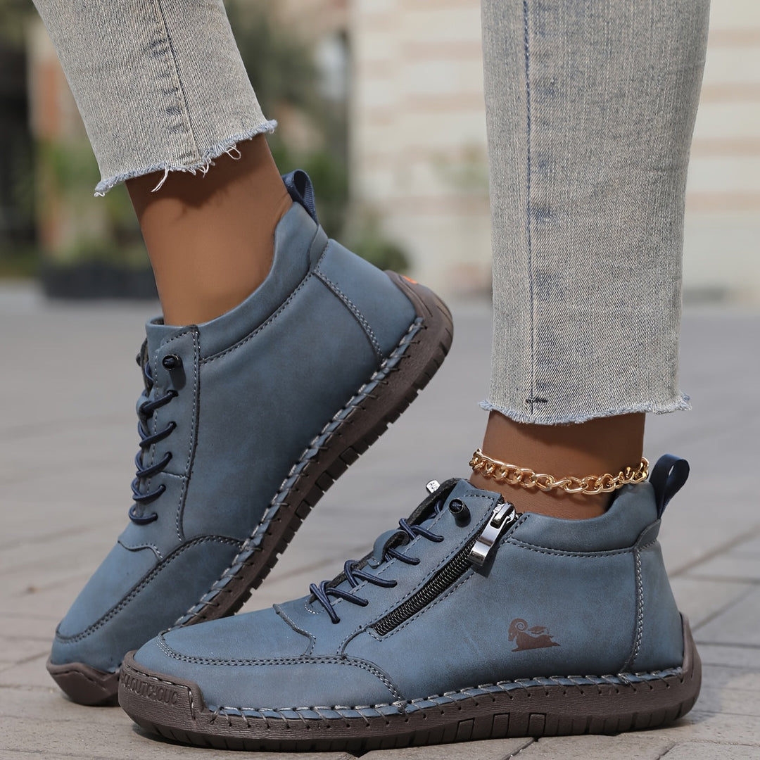 Chaussure lacée zippée, coloris bleu, vue de profil