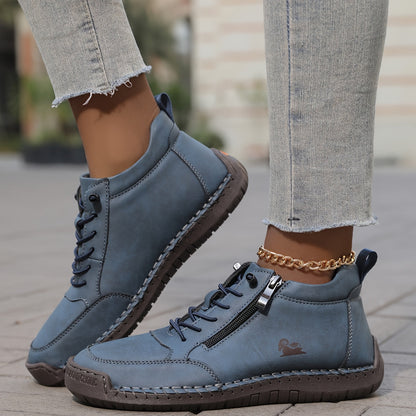 Chaussure lacée zippée, coloris bleu, vue de profil