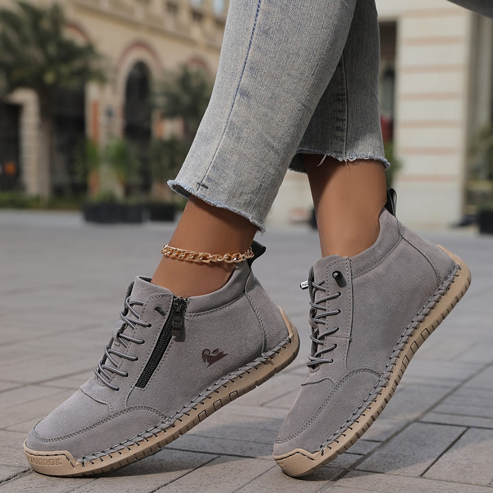 Chaussure lacée zippée, coloris gris, vue de profil