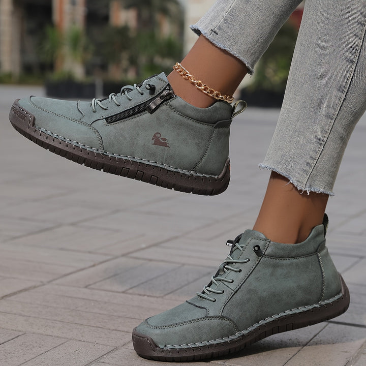 Chaussure lacée zippée, vue de profil