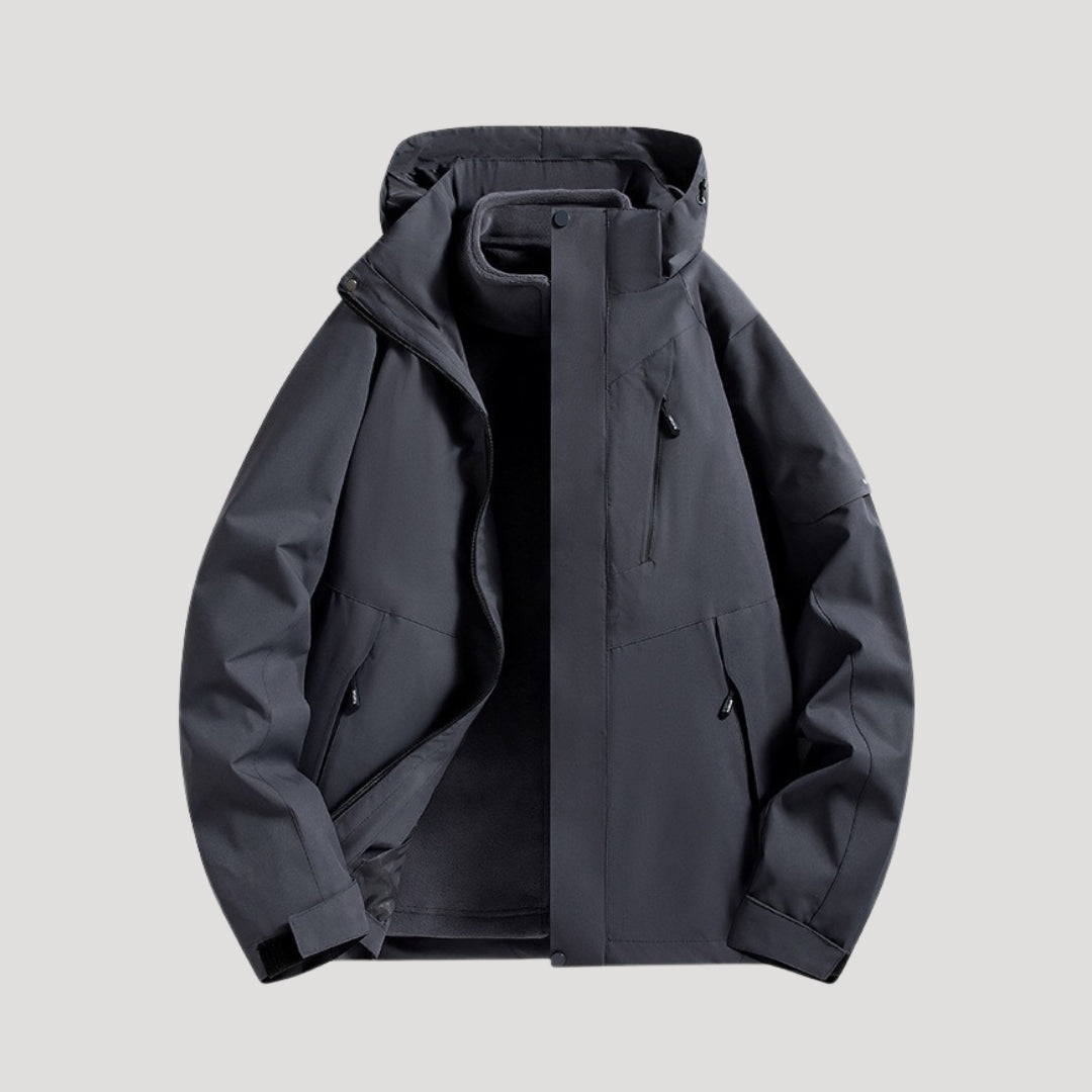 Coupe-vent à capuche, coloris noir, vu de face