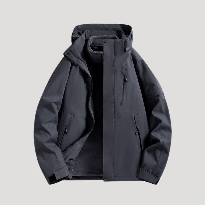 Coupe-vent à capuche, coloris noir, vu de face