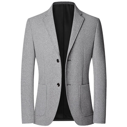 Blazer gris clair en tissu texturé, col cranté et deux boutons, vue de face