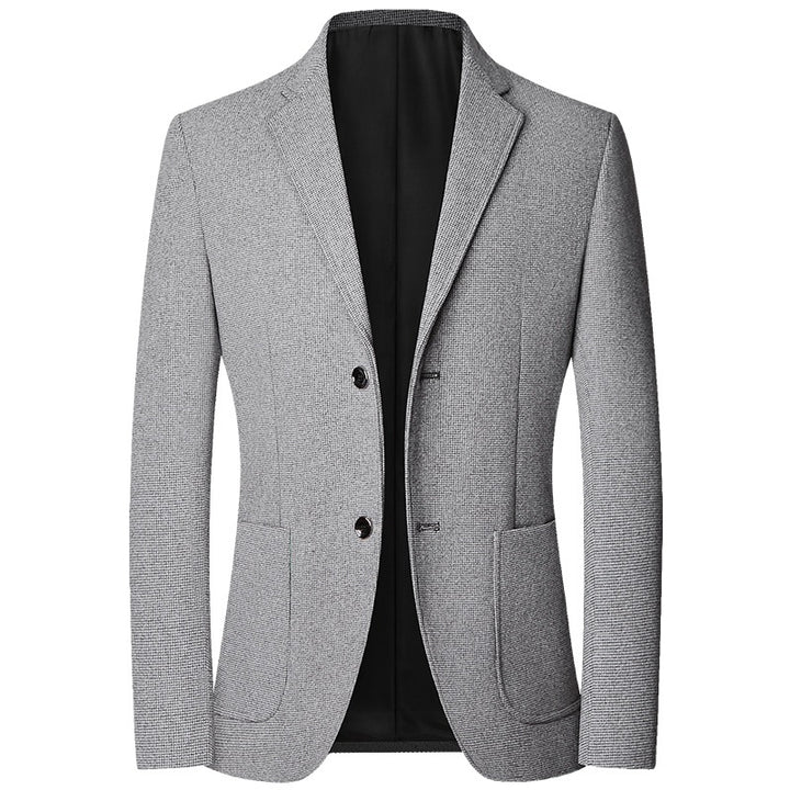 Blazer gris clair en tissu texturé, col cranté et deux boutons, vue de face