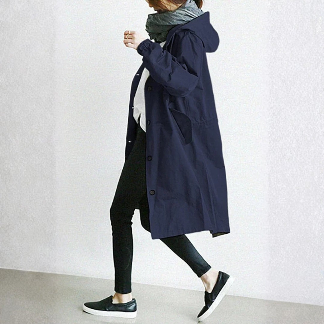 Manteau long à capuche, coloris bleu, vu de face