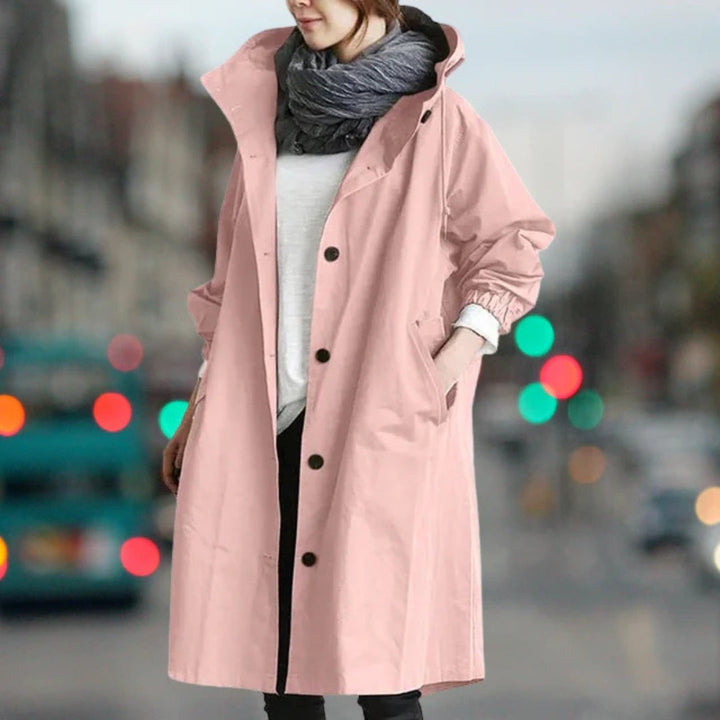Manteau long à capuche, coloris rose, vu de face