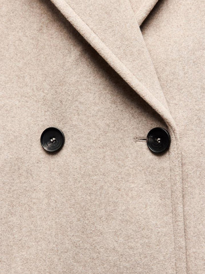 Manteau long croisé ample, boutons et revers