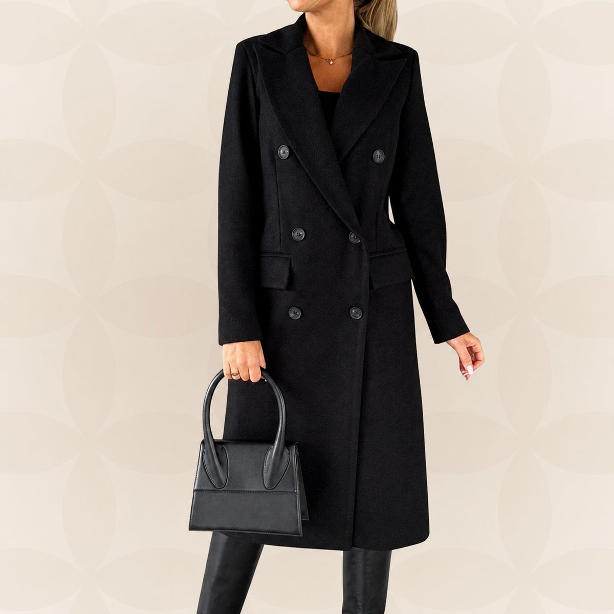 Manteau long croisé cintré, coloris noir, vue de face