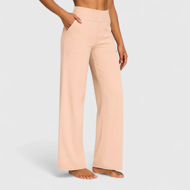 Pantalon large à taille haute, coloris abricot, vu de face