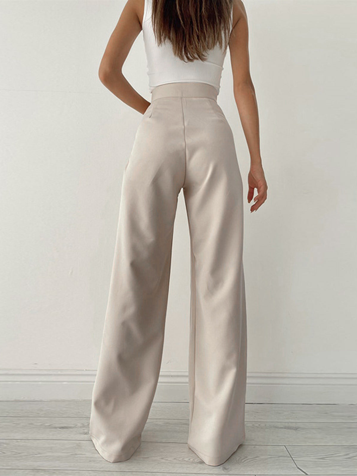 Pantalon large plissé, coloris beige, vue de dos