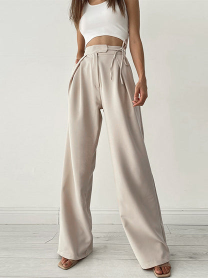 Pantalon large plissé, coloris beige, vue de face