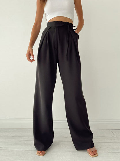 Pantalon large plissé, coloris noir, vue de face