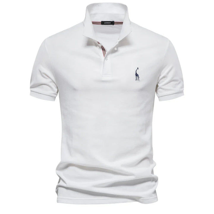 Polo en piqué blanc, col à liseré rayé rouge et bleu, girafe brodée sur la poitrine